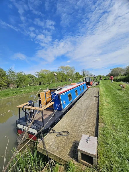 Upsy Daisy moored with countryside backdrop