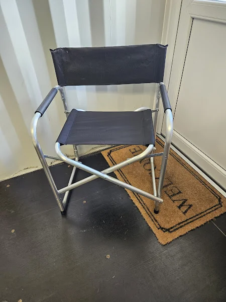 Folding camping chairs set up outside